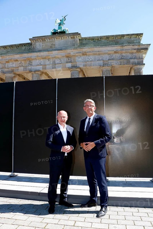 Kai Wegner (Governing Mayor of Berlin) and Wolfram Weimer (Federal Government Commissioner for Culture and the Media of the Federal Republic of Germany) ahead of the press conference marking the 65th anniversary of the construction of the Berlin Wall on Platz des 18. März in Berlin on 12 August 26