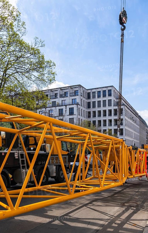 Mobi Hub, heavy construction machine with special technology setting up a crane in the narrow Schumannstraße at Agries Sorma Park, Berlin, Germany