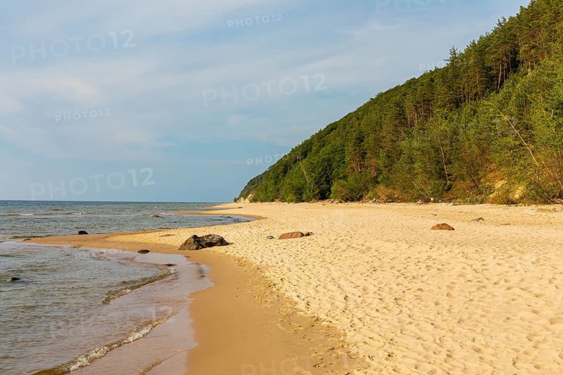 Beach at sunset, close to Miedzyzdroje (Misdroy), a village in Kamien Pomorski County, West Pomeranian Voivodeship, in northern Poland and the Wolin National Park