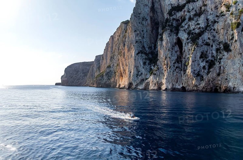 Motorboat rides on picturesque rocky coast ImmorgenLicht, cliffs, Golfo di Orosei, Baunei, Sardinia, Italy