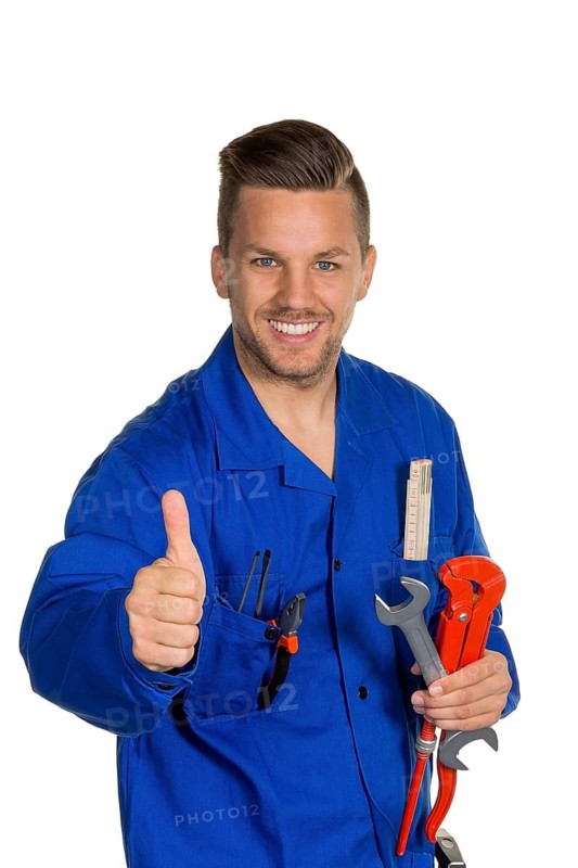 A worker in a commercial enterprise, craftsman, with tools in hand, installer, plumber Studio shot, Vienna, Austria