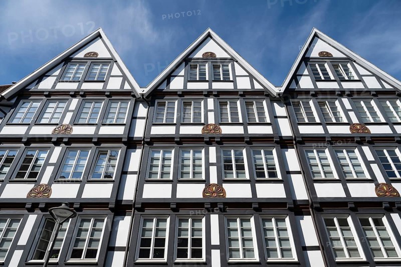 Several historic gabled houses side by side, half-timbered houses, pedestrian zone, Brüderstraße, Soest, Westphalia, North Rhine-Westphalia, Germany