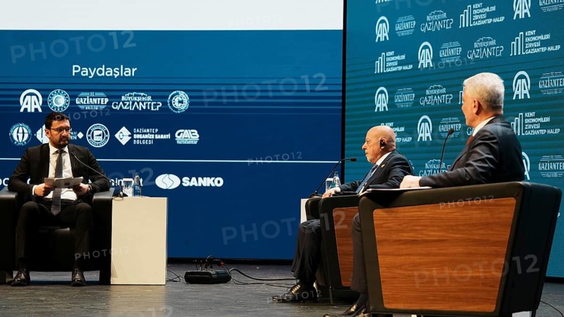 GAZIANTEP, TURKEY - JUNE 9, 2026: Turkish Minister of Trade Omer Bolat and Syrian Minister of Economy and Industry Mohammad Nidal al-Shaar participate in a panel discussion during the Anadolu City Economies Summit held in Gaziantep. The high-level event focuses on strengthening bilateral relations, cross-border trade, economic cooperation, and the reconstruction of Syria, Gaziantep, Turkey