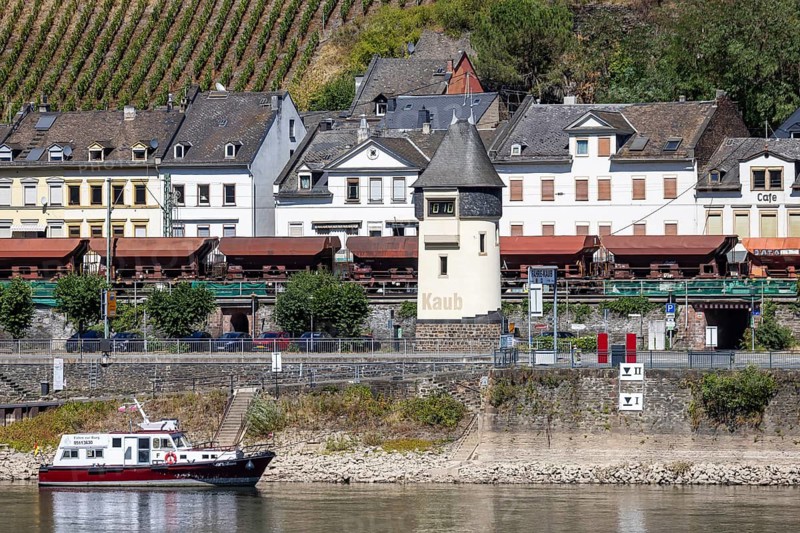 The Kaub level on the Middle Rhine is at a low level. Rhine navigation is extremely affected by low tide levels. There are only a few ships left, and they are traveling with reduced freight. Kaub, Rhineland-Palatinate, Germany