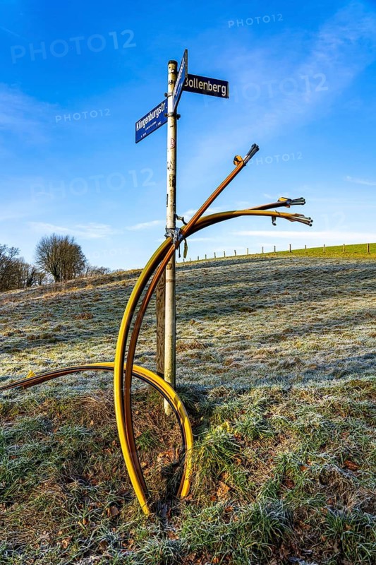 Fibre optic connection, empty conduits protrude from the ground along a dirt track, into which the actual fibre optic cable is later blown and connected to the respective house connection or distributor, provision of fast Internet in rural areas, in the south of Mülheim an der Ruhr, North Rhine-Westphalia, Germany