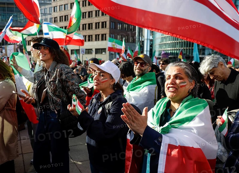 Iranians demonstrate on the day of the US and Israeli attack on Iran in Berlin, 28.02.2026. People cheer the rumor that Obermullah Khamenei died in the attack, Berlin, Berlin, Germany