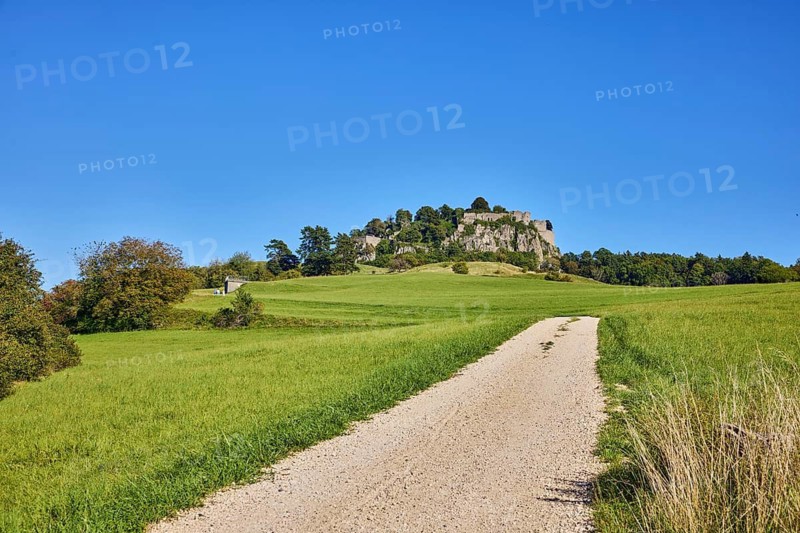Hohentwiel mountain, Hohentwiel fortress ruins, cinder stone footpath, nature reserve, meadow, shrubs, trees, hilly landscape, landscape photography, blue sky, cloudless, Hilzingen, Hegau, Konstanz district, Baden-Württemberg, Germany