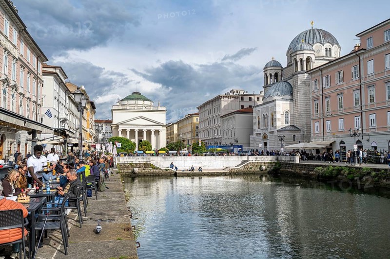 Restaurants on the Grand Canal with reflection, Sant'Antonio Taumaturgo church and Serbian Orthodox church Santissima Trinità e di San Spiridione, Borgo Teresiano, Trieste, Friuli-Venezia Giulia region, Italy