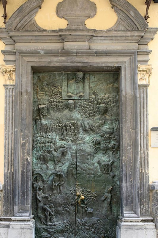 A sculptural bronze door was commissioned in commemoration of a visit by Pope John Paul II in 1996, The main door, by Mirsad Begic, symbolizes 1, 250 years of Christian history in Slovenia. Ljubljana, Slovenia