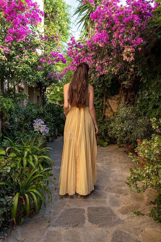 A model photographed in Rue des Amoureux in the village of Ramatuelle, Ramatuelle, Var, Provence-Alpes-Cote d'Azur, France