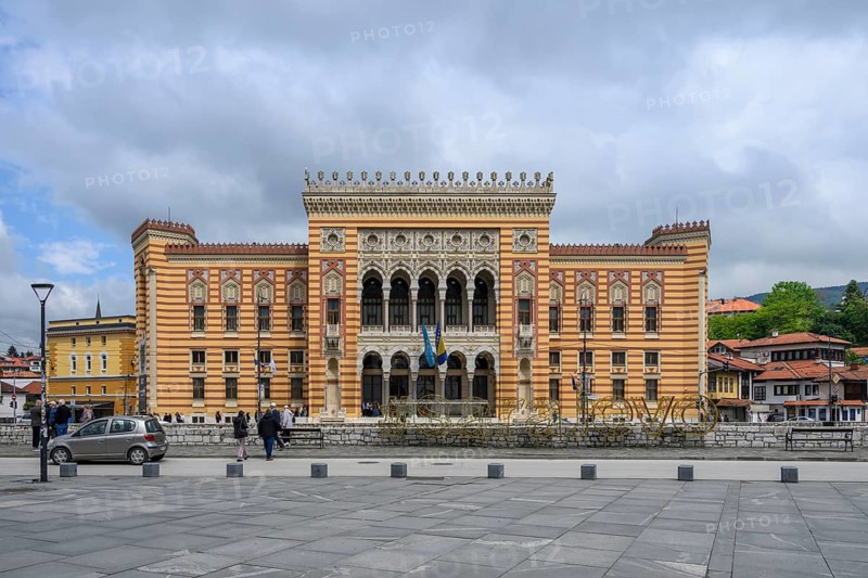 Sarajevo City Hall, known as Vijecnica, is located in the city of Sarajevo, Bosnia and Herzegovina. It was designed in 1891 by the Czech architect Karel Parík, but completed by Alexandar Wittek and Ciril M. Ivekovic. The building now houses the national and university libraries, the city council, and a museum
