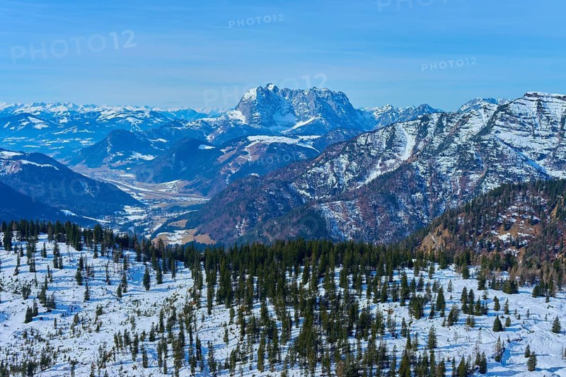Snow-covered mountain landscape with forests under a clear sky, Wilderkaiser, Kaiser Mountains, Tyrol, Austria