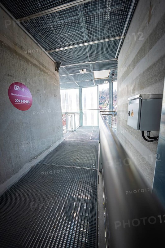 Modern corridor with grid floor and concrete walls, industrial atmosphere, Hermann Hesse Bahn, ZOB, Calw, Germany