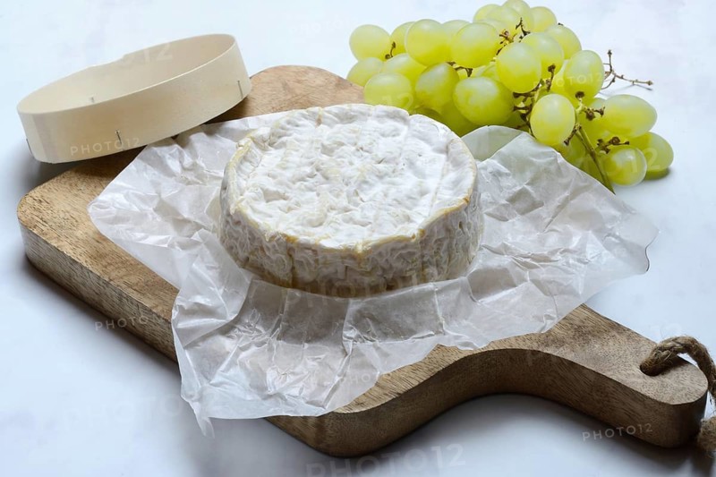 French Camembert, cheese on a wooden board