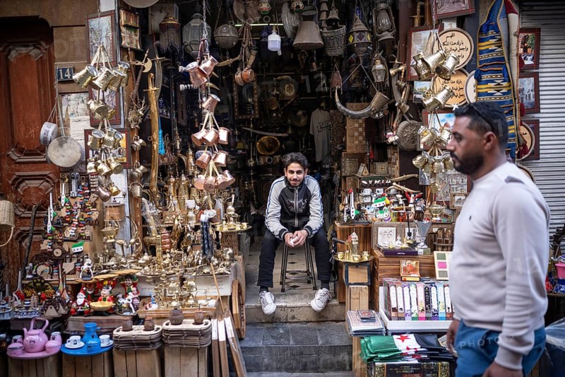 Damascus, Syria. December 4th 2025. A Syrian shop keeper selling tourist souvenirs in Qamaria Street near Al Nawfra coffee shop in Damascus Old City, Syria