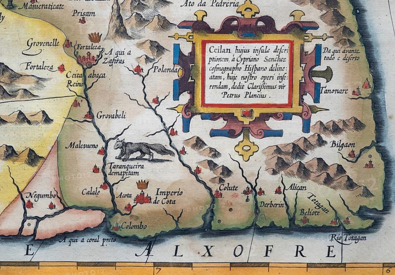 Old coloured map of Ceylon or Sri Lanka decorated with decorative cartouche, by Jodocus Hondius from the Mercator Hondius Atlas, Amsterdam, 1633
