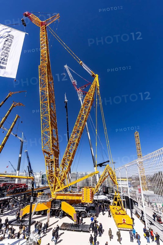 LG 1800-1.0 lattice boom crane with a maximum lifting height of 204 metres for wind turbines. BAUMA Munich, 34th World's Leading Trade Fair for Construction Machinery, Building Material Machines, Mining Machines, Construction Vehicles and Construction Equipment. In 2025, the trade fair will attract around 600, 000 visitors from more than 200 countries and regions and 3601 exhibitors. Open-air area with exhibits from Liebherr. Munich, Bavaria, Germany