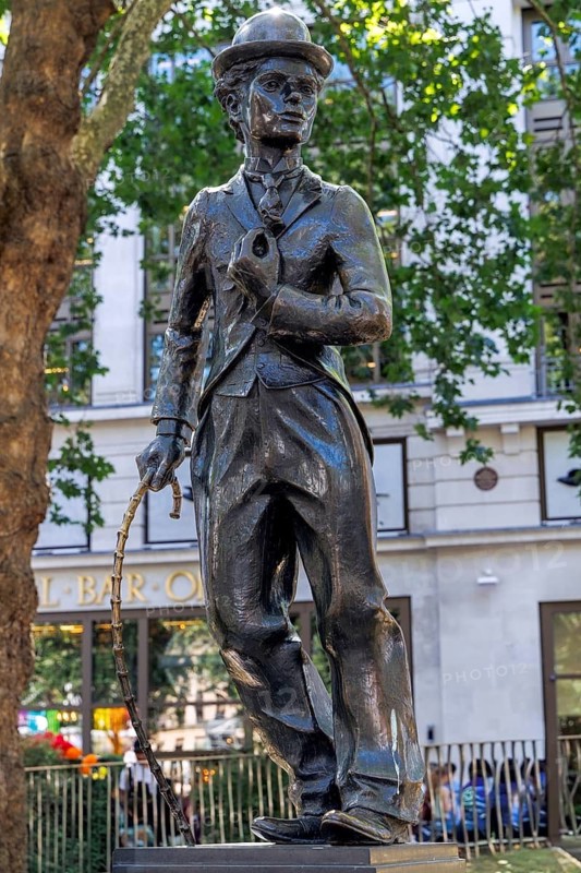 Bronze statue of Charlie Chaplin as The Tramp stands in Leicester Square, London, England, United Kingdom