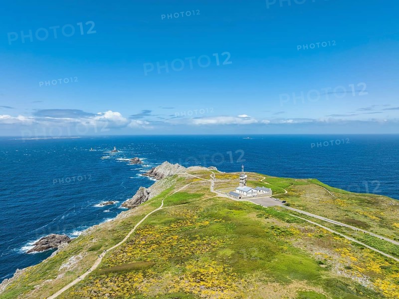 Aerial view of Pointe du Raz with the Sémaphore de la Pointe du Raz, on the left horizon the Phare de la Vieille lighthouse on a rocky island, Pointe du Raz, Finistère, Brittany, France