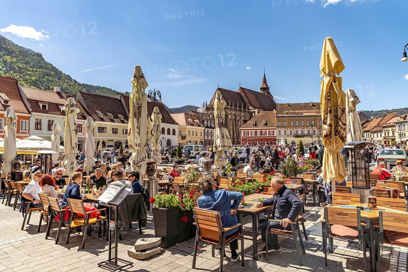 Restaurants on Pia?a Sfatului, Council Square in the center of Brasov or Kronstadt, Transylvania, Romania