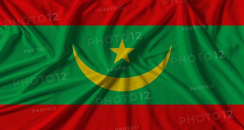 Mauritania flag with fabric texture background. National flag of Mauritania with cloth texture