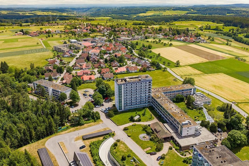 Aerial view of a village with residential buildings and vast fields, Wart, Altensteig, Germany