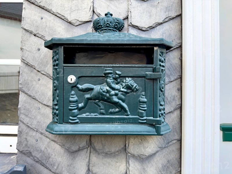 Postbox with historical Postreiter motif, Germany