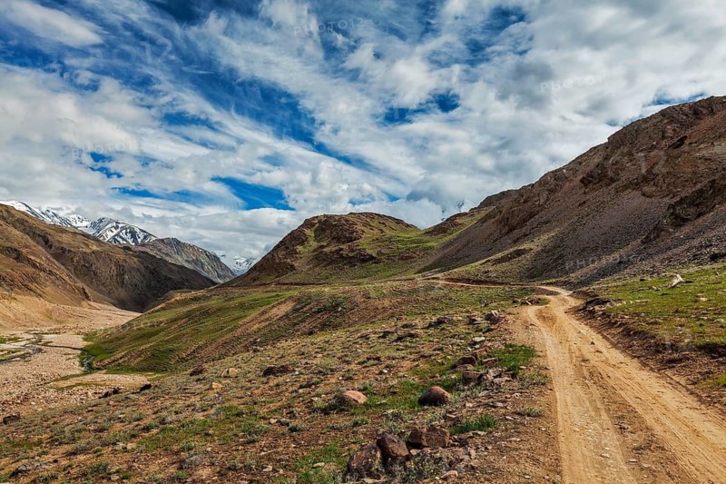 Dirt road in Spiti valley in Himalayas. Spiti valley, Himachal Pradesh, India
