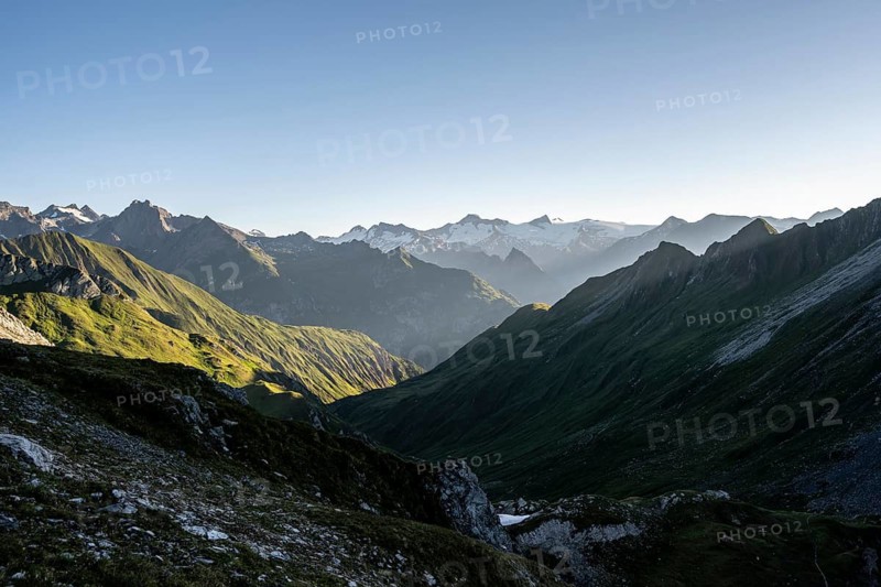 Mountain landscape at sunrise, view of mountain peaks of the Venediger group and into the Großbachtal valley from the summit of Bachlenkenkopf, Lasörling group, Hohe Tauern National Park, East Tyrol, Tyrol, Austria