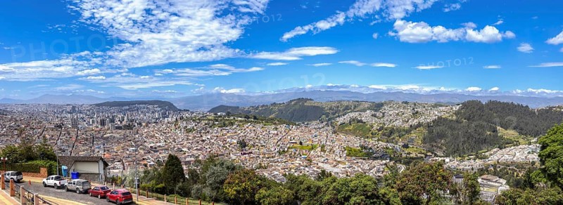 Skyline panoramic view of historic center in Quito, Ecuador from lookout of Virgin of Panecillo