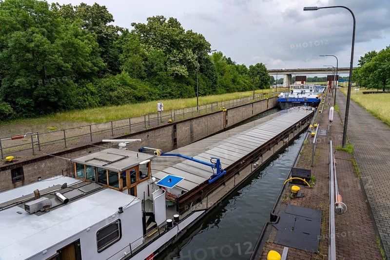Cargo ship, tanker, in the Duisburg-Meidrich canal lock, to continue on the Rhine-Herne Canal eastwards, North Rhine-Westphalia, Germany