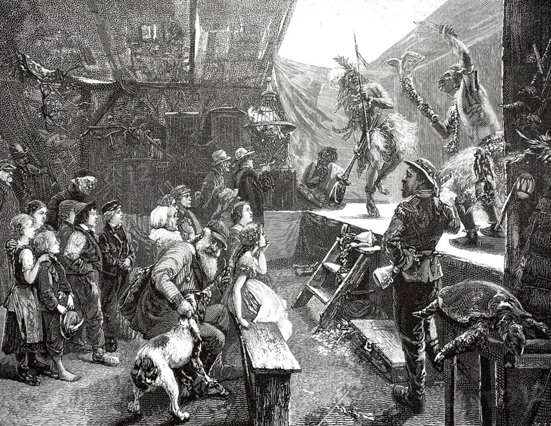Illustration shows a European Völkerschau, human zoo, from the late 19th or early 20th century. At these commercial events, indigenous people from non-European regions were showcased in front of a paying audience. In the upper right area, two traditionally or ritually dressed actors, indigenous dancers or warriors, perform a performance on an improvised wooden ramp, illustration, reproduction of a model from the 19th authentic, file restored for optimal use, exact date of original unknown, historical