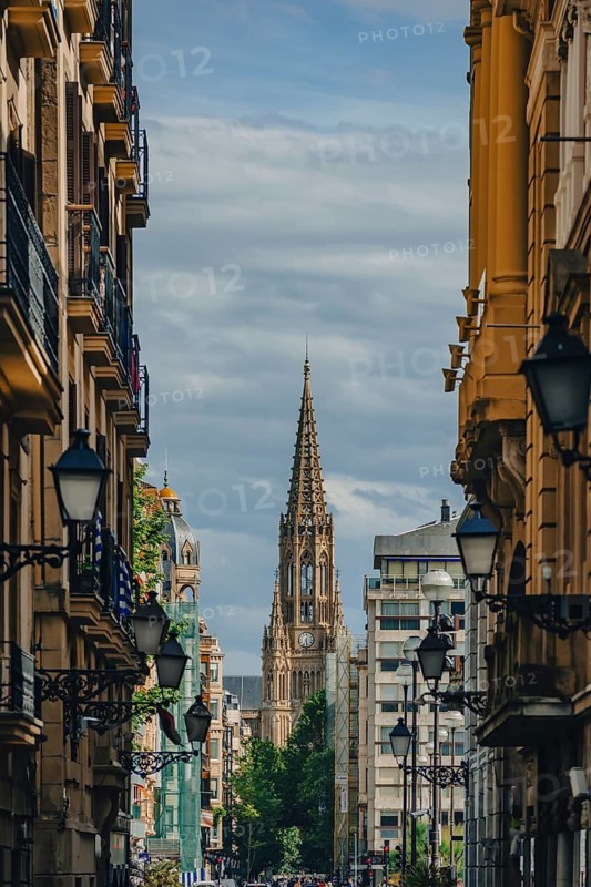 A street in the old town with a view of the Cathedral of the Good Shepherd (Catedral del Buen Pastor), San Sebastián, Basque Country, Spain