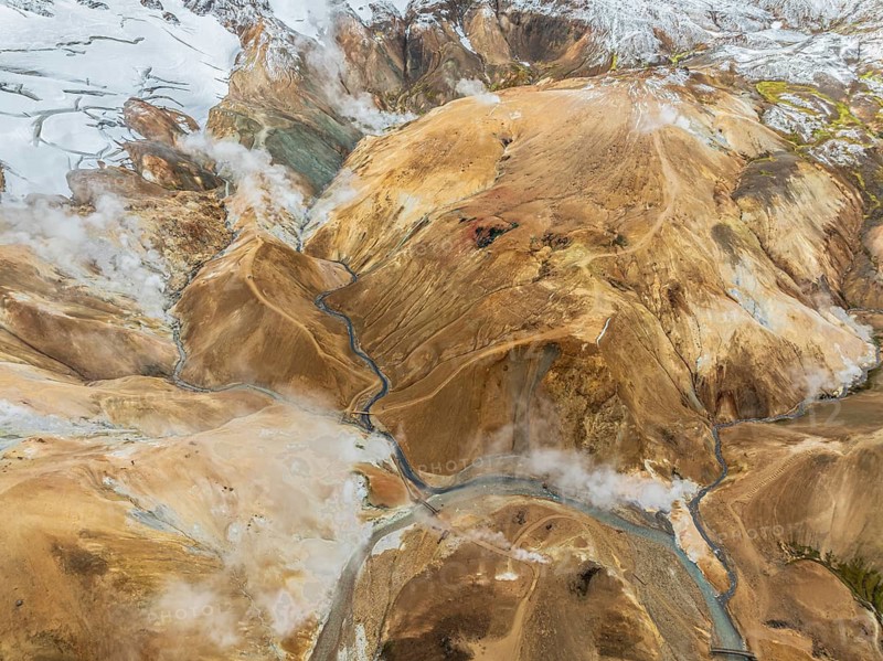 Steaming hot springs and colourful rhyolite mountains, aerial view, Hveradalir geothermal area, Kerlingarfjöll, Icelandic highlands, Iceland