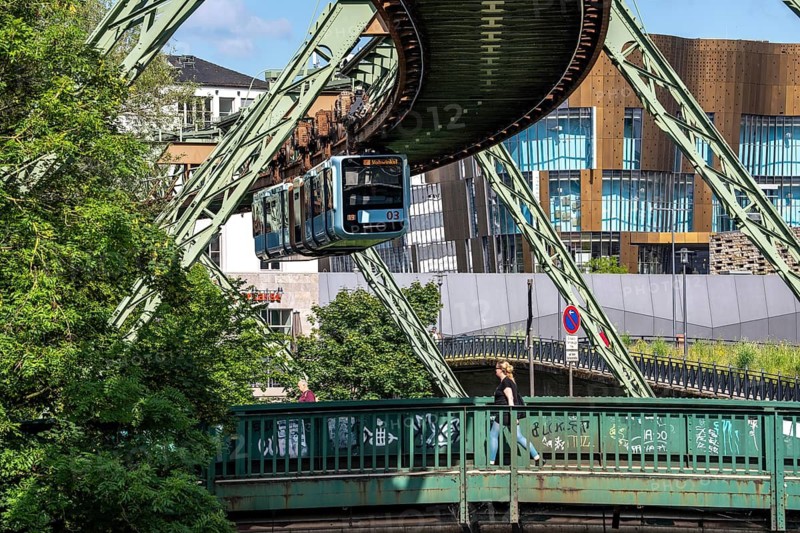 The Wuppertal suspension railway runs above along the Wupper River, between the central railway station stop and Ohligsmühle, Germany