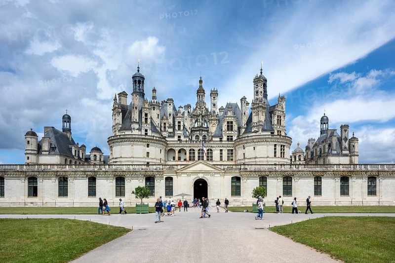 Southeast view, detailed view of the monumental Renaissance Château de Chambord castle with its distinctive, richly decorated roof silhouette of numerous towers, chimneys and dormers, Chambord Castle, Blois arrondissement, Loir-et-Cher department, Centre-Val de Loire region, France