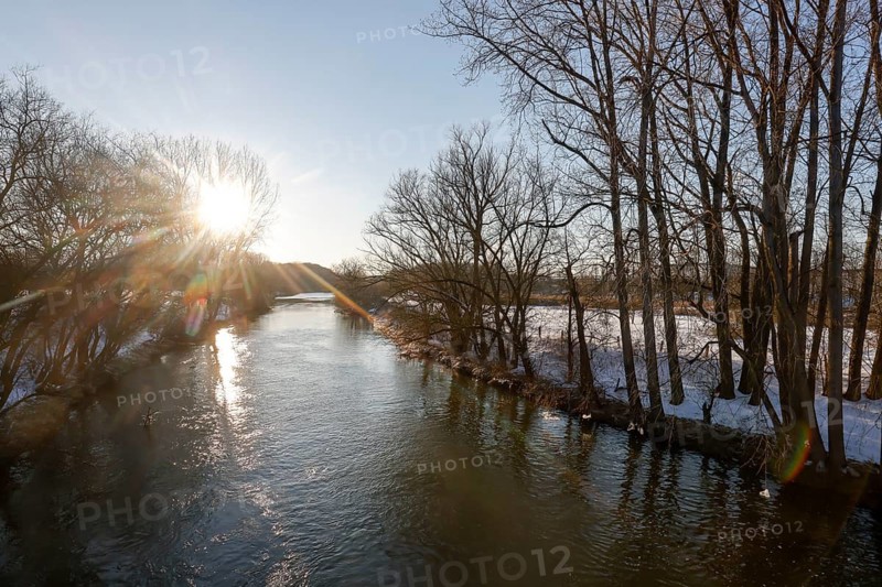 Lünen, North Rhine-Westphalia, Germany - Sunny winter landscape in the Ruhr area, sunset with ice and snow on the river Lippe