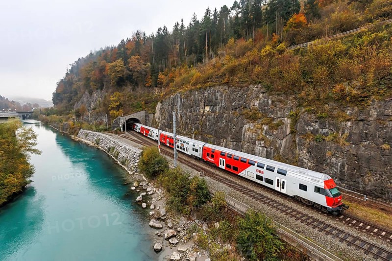 Double-decker train of the S-Bahn Vorarlberg of the Austrian Federal Railways ÖBB Eisenbahn Nahverkehr in autumn in Feldkirch, Austria