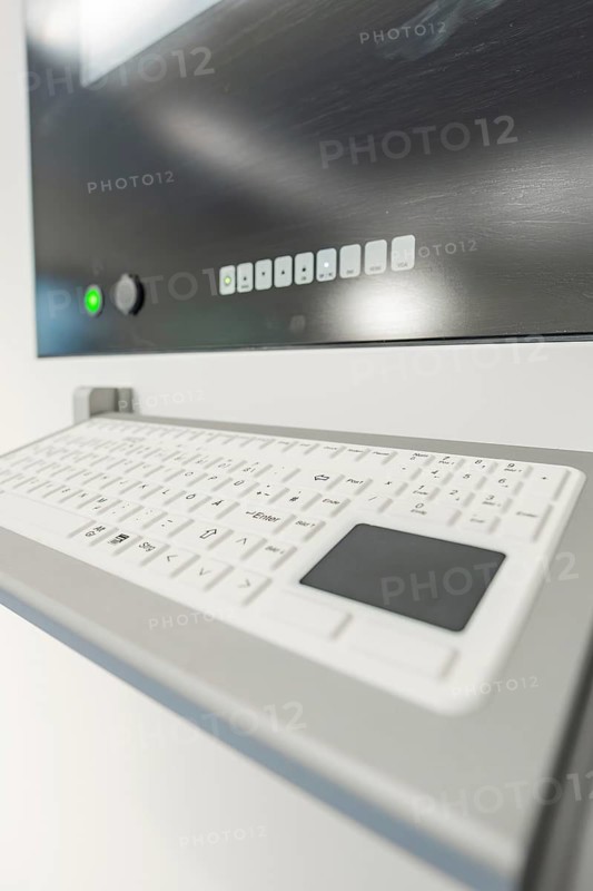 Close-up of a medical keyboard in front of a monitor, operating room in the new Calw hospital, Calw district, Germany
