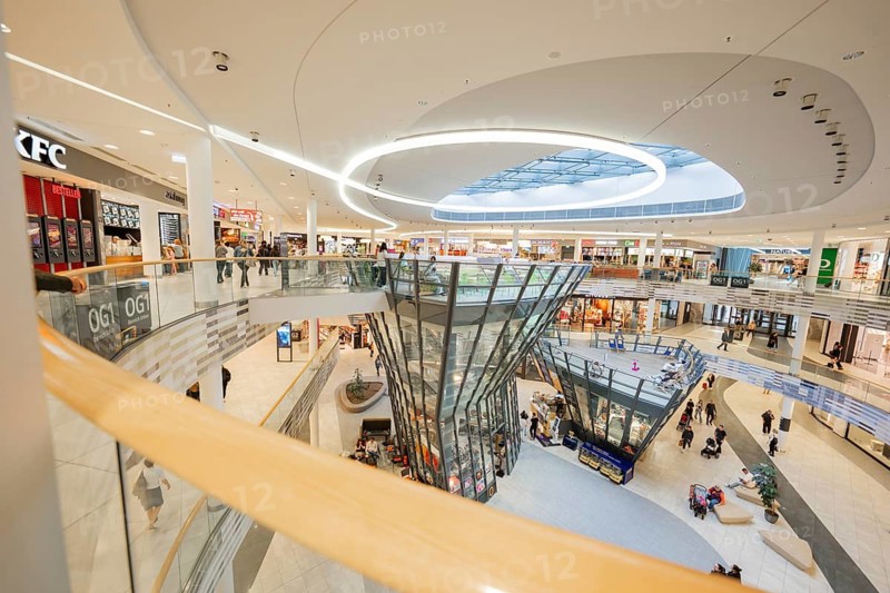 Modern shopping center with glass roof and lively atmosphere, Milaneo, Stuttgart, Germany