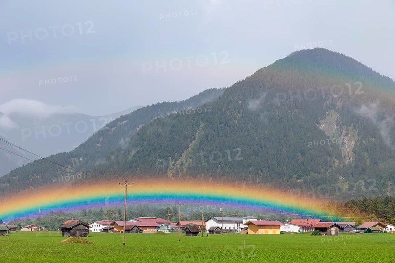 A double rainbow at Mittenwald municipality after a hefty thunderstorm. Bavaria, Germany