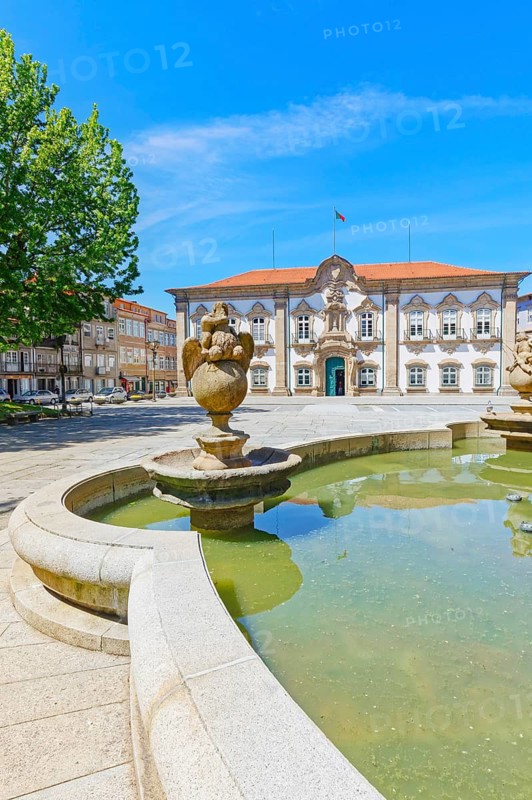View of Pelican fountain and Braga town hall in the background, Braga, Minho Province, Portugal