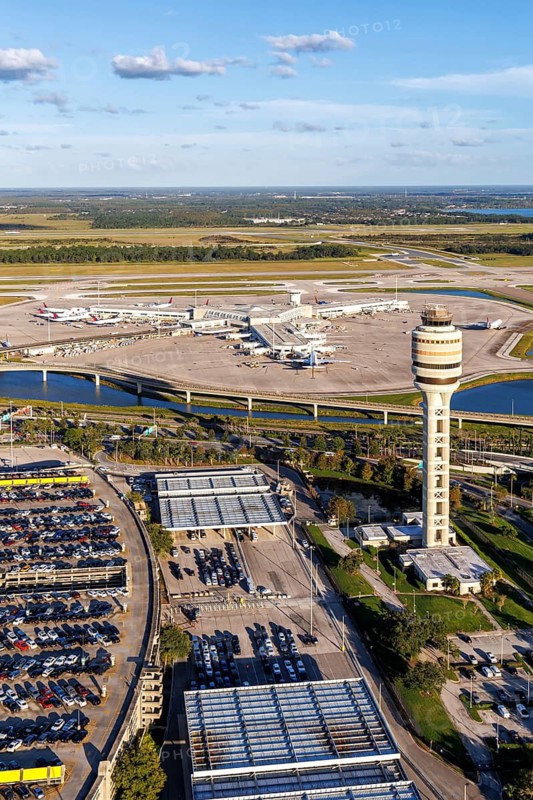 Aerial view of Orlando International Airport with Terminal Concourse Airside 4 and Tower in Orlando, USA