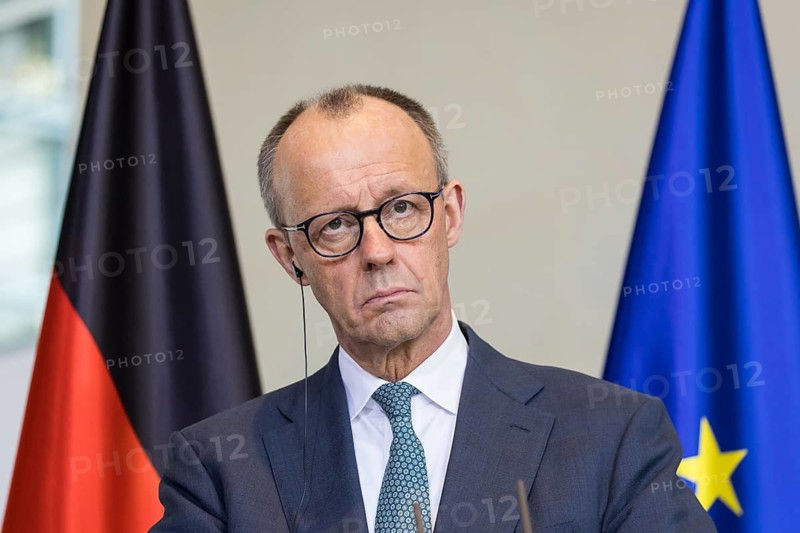 Friedrich Merz (Chancellor of the Federal Republic of Germany, CDU) at a joint press conference with Ahmed al-Sharaa (President of the Syrian Arab Republic) after a one-on-one meeting at the Federal Chancellery, Berlin, 30 March 2026