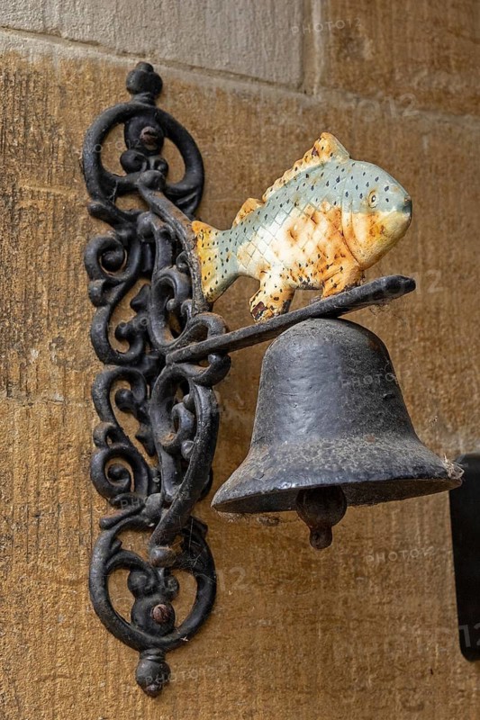 Fish figure, bell, Bibury, The Cotswolds, England, Great Britain