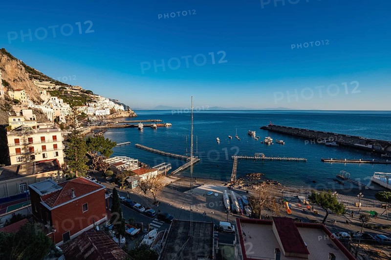 AMALFI, ITALY - JANUARY 13, 2024: View of Amalfi town with blue sea on Amalfi Coast in Campania, Italy