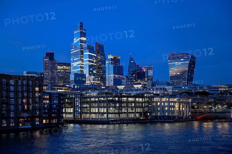 City of London skyline with skyscrapers 22 Bishopsgate, Leadenhall Building, Cheesegrater, and 20 Fenchurch Street, walkie talkie, on the Thames, blue hour, London, England, Great Britain, Great Britain