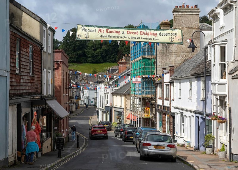 Ancient Ale Tasting and Bread Weighing Ceremony event banner crossing East Street, town of Ashburton, Devon, England, UK