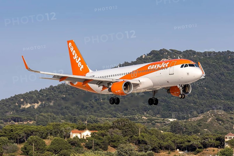An easyJet Airbus A320 aircraft with the license plate G-EZWK at Rhodes airport, Greece