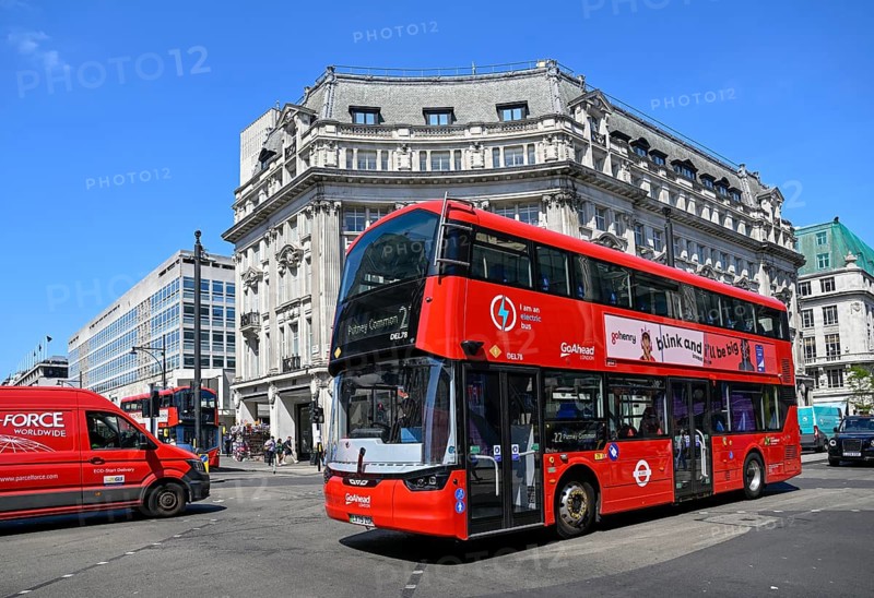 Red double-decker bus at Oxford Circus at the intersection of Oxford Street and Regent Street, City of Westminster, London, England, Great Britain, Great Britain
